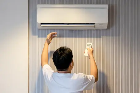 Man trying to fix his Broken AC